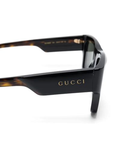 Gucci - lunettes de soleil à logo gravé